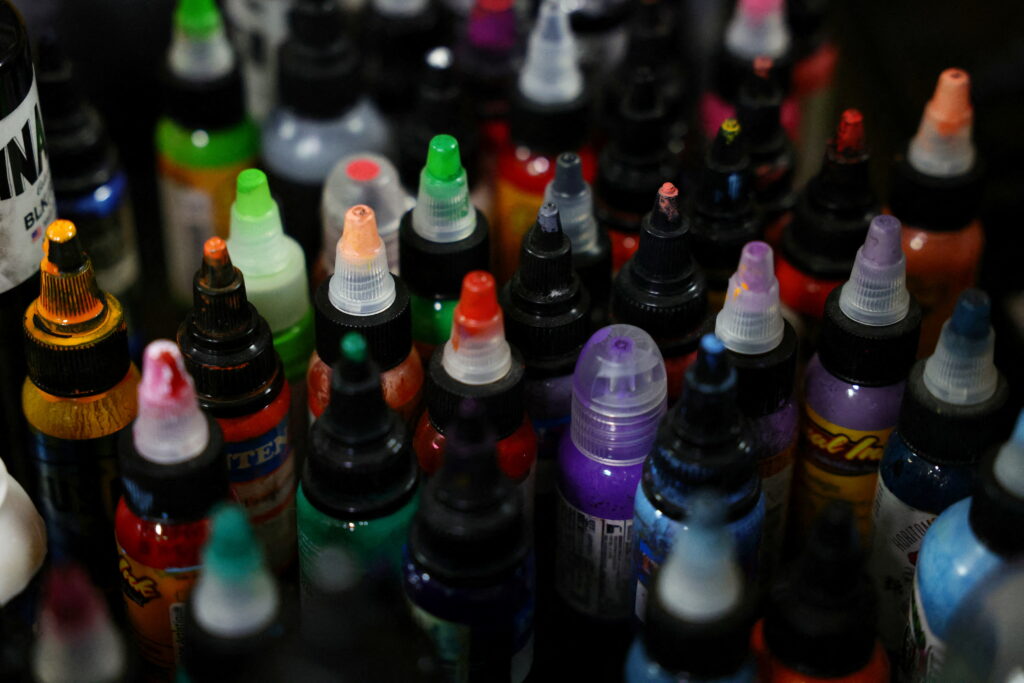 What are the types of tattoo ink and what are they used for?